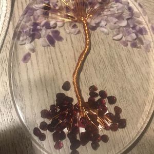 Resin tree of life with amethyst chips inside.